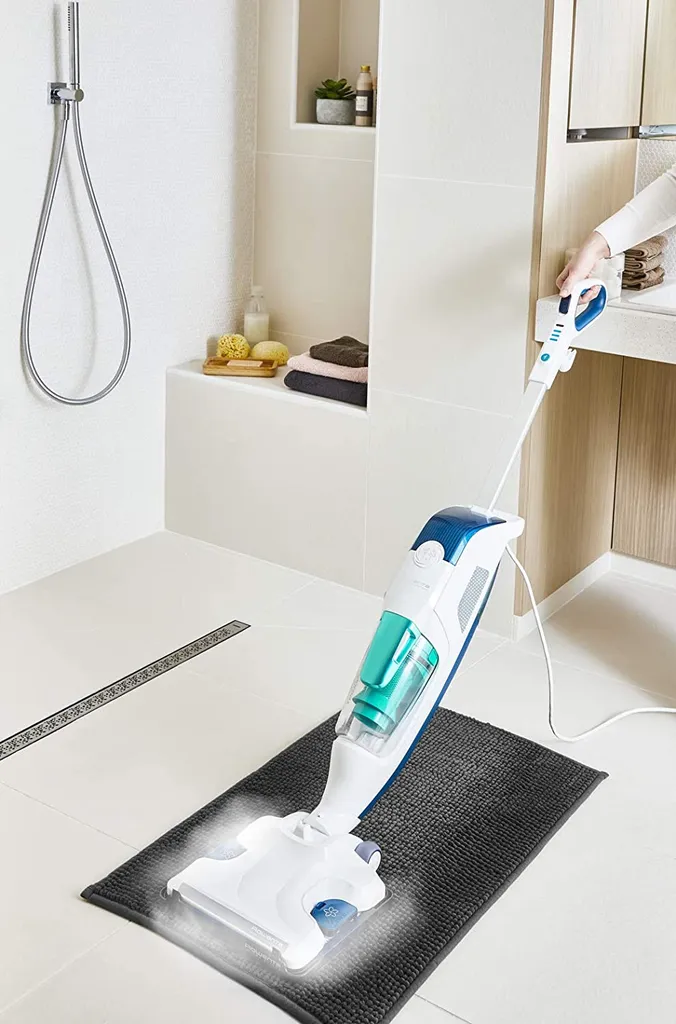 Rowenta Bodendampfreiniger Clean & Steam Revolution RY7757 | 2 In 1 Reingung | Verdampfer Für ätherische Öle | Alle Bodenarten | Anti-Kalk-Kartusche | Weiß/Blau 7 Rowenta Bodendampfreiniger Clean & Steam Revolution RY7757 | 2 In 1 Reingung | Verdampfer Für ätherische Öle | Alle Bodenarten | Anti-Kalk-Kartusche | Weiß/Blau – Bild 7
